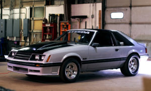 Gray and black two door Fox Body Mustang
